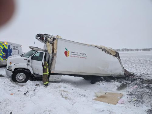 Truck filled with medical supplies slides off icy North Dakota highway
