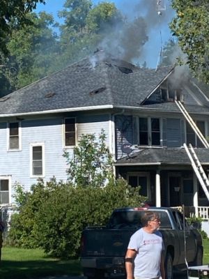 Man jumps from roof of burning Waverly home