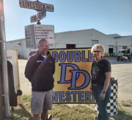 Judy Stevens owner of DD Western Wear with News Director Mike Tanner