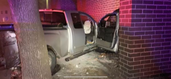 One person injured when pickup runs into Watertown Post Office