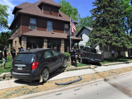 Collision launches vehicles into front yard of Watertown home